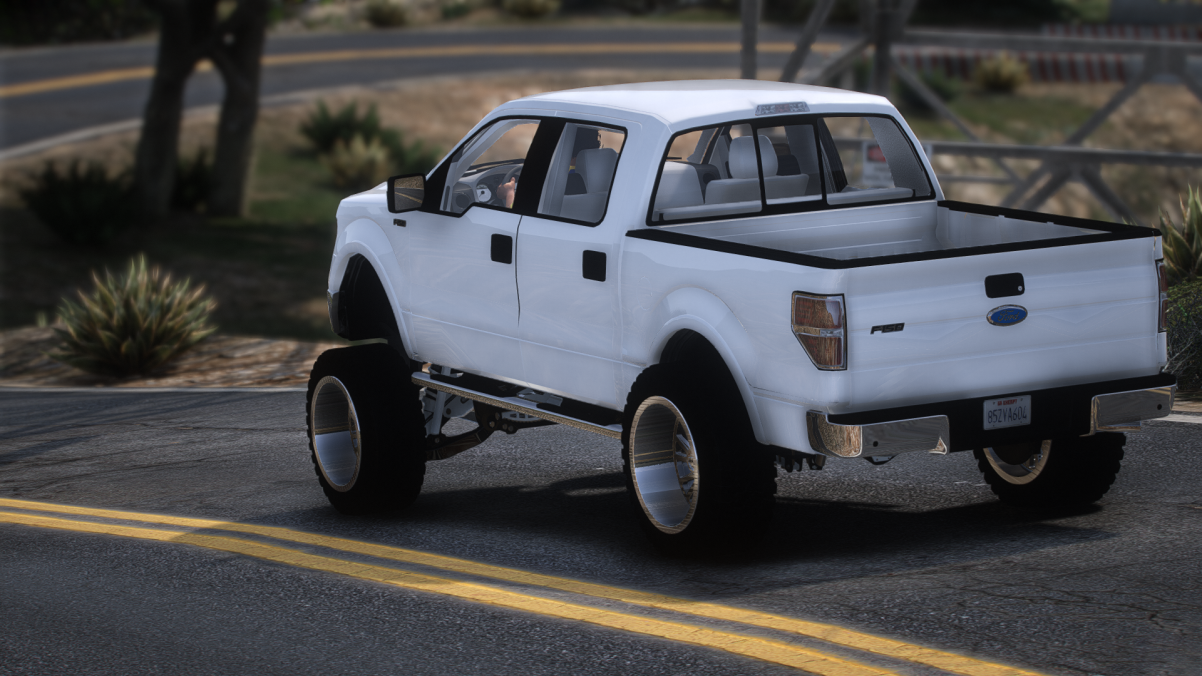 Squatted 2010 Ford F150 Pickup Truck